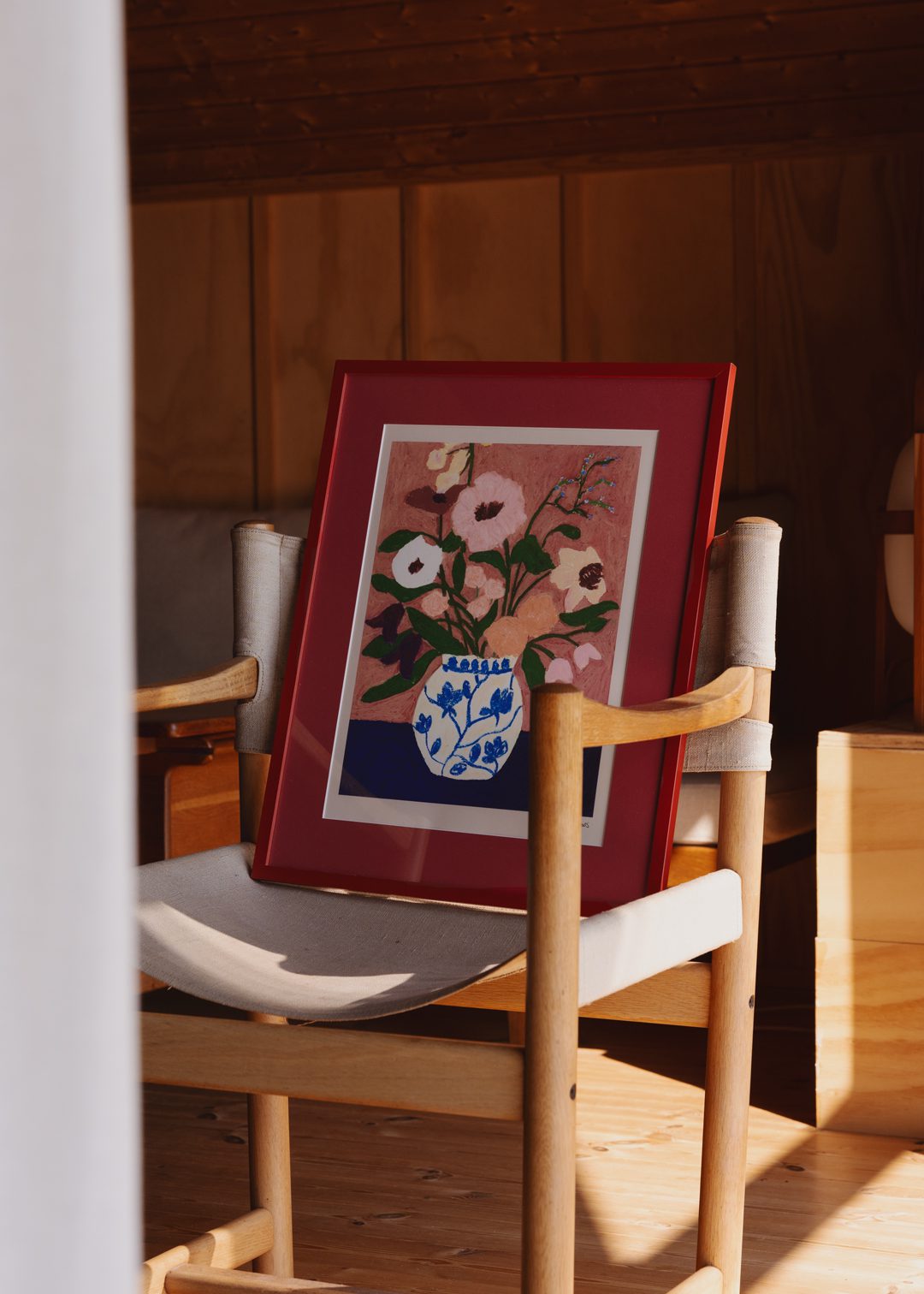 Flowers on Blue Table by Carla Llanos | The Poster Club