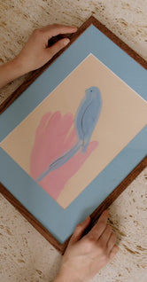 Parrot in Hand by Oamul