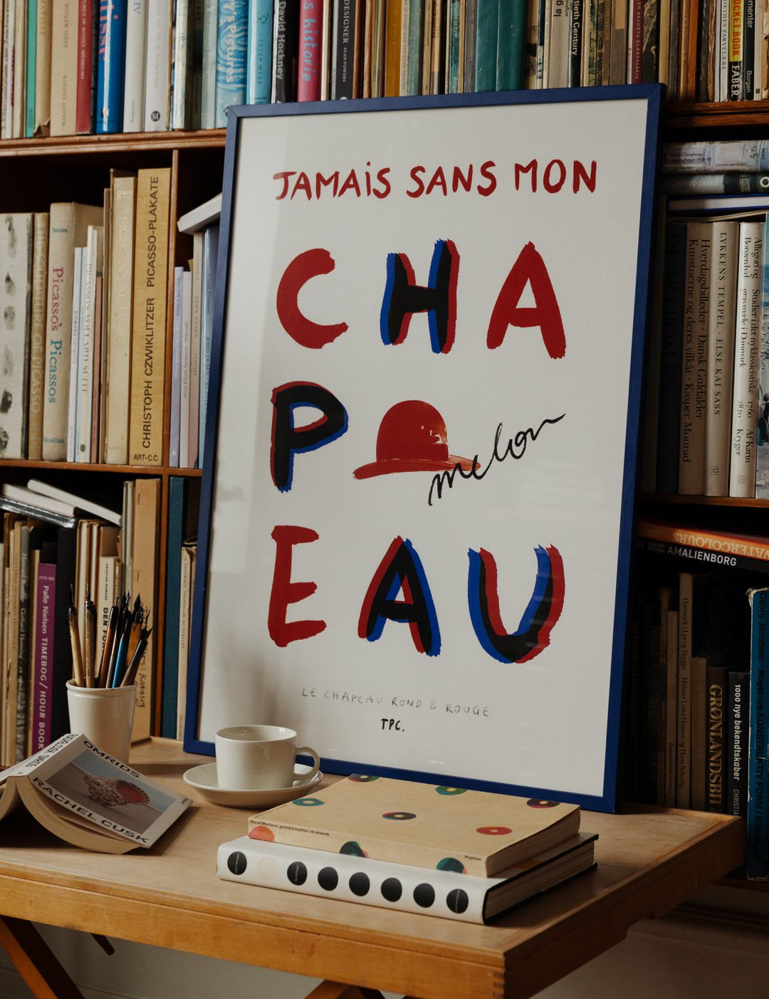 Le Chapeau Rond et Rouge